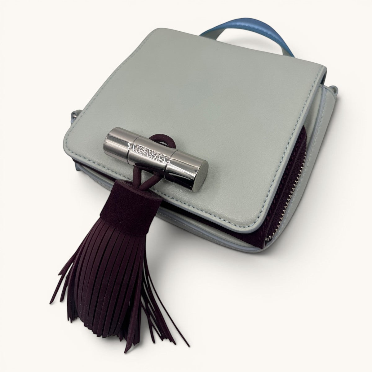 Kenzo · Kenzo Paris · mini bag · top handle bag · crossbody bag · tassel bag · colour block · grey leather bag · chain strap · designer handbag · second hand luxury · prabangios rankinės · naudota rankinė · Kenzo originali