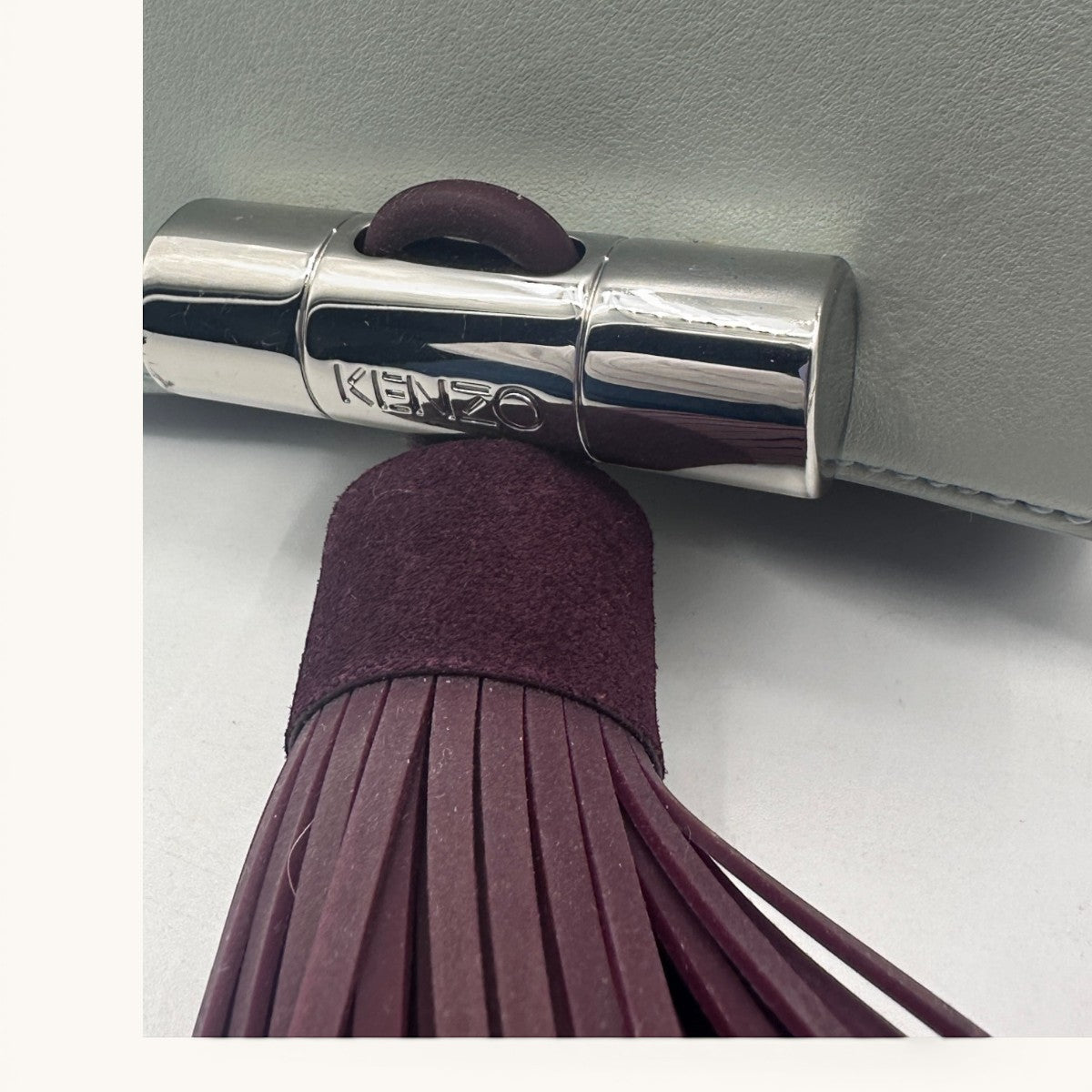 Kenzo · Kenzo Paris · mini bag · top handle bag · crossbody bag · tassel bag · colour block · grey leather bag · chain strap · designer handbag · second hand luxury · prabangios rankinės · naudota rankinė · Kenzo originali